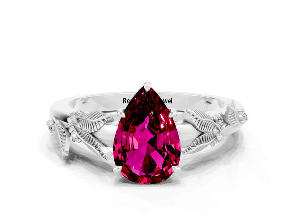 Platinum Pear Cut Garnet Solitaire Ring with Leaf Motif Band and Four-Prong Setting