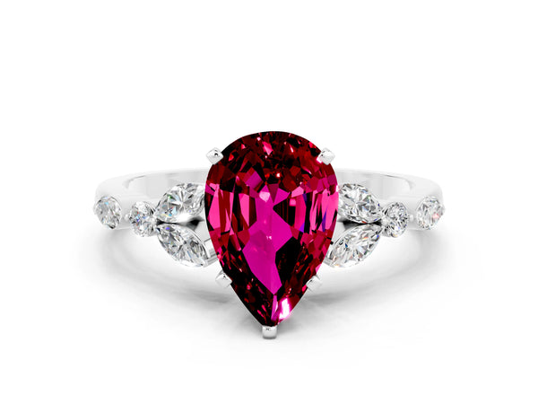 Silver Pear Cut Garnet Solitaire Ring with Side Stones and Four-Prong Setting