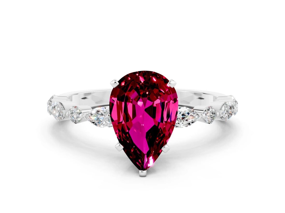 White gold Pear Cut Garnet Solitaire with Side Stones on a Pavé Band and Four-Prong Setting