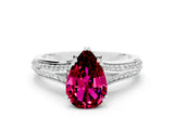 White gold Pear Cut Garnet Split Shank Engagement Ring with Pavé Band