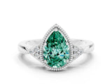 White gold Pear Cut Green Sapphire Halo Ring with Tapered Band and Four-Prong Setting