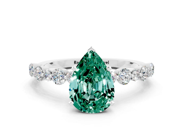 Platinum Pear Cut Green Sapphire Prong Set Engagement Ring with Pavé Band