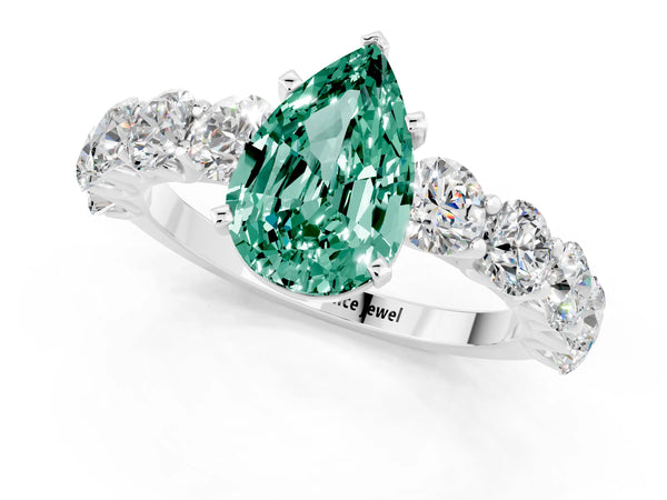 Platinum Pear Cut Green Sapphire Prong Setting with Side Stones on a Pave Band