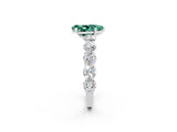 White gold Pear Cut Green Sapphire Prong Setting with Side Stones on a Pave Band_2
