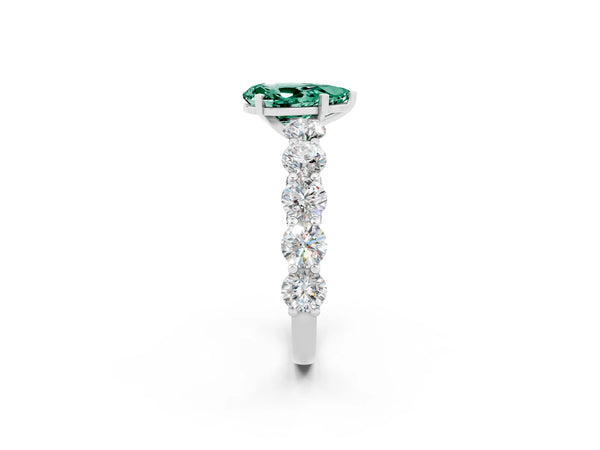 White gold Pear Cut Green Sapphire Prong Setting with Side Stones on a Pave Band
