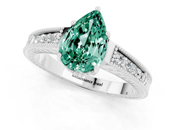 Platinum Pear Cut Green Sapphire Ring with Milgrain Pavé Band and Four-Prong Setting