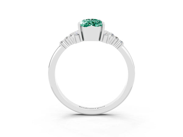 Platinum Pear Cut Green Sapphire Ring with Side Stones and Four-Prong Setting