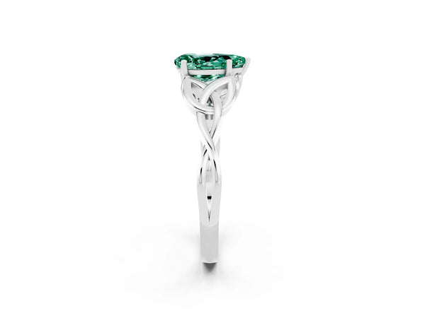 White gold Pear Cut Green Sapphire Solitaire Engagement Ring with Celtic Knot Band and Four-Prong Setting