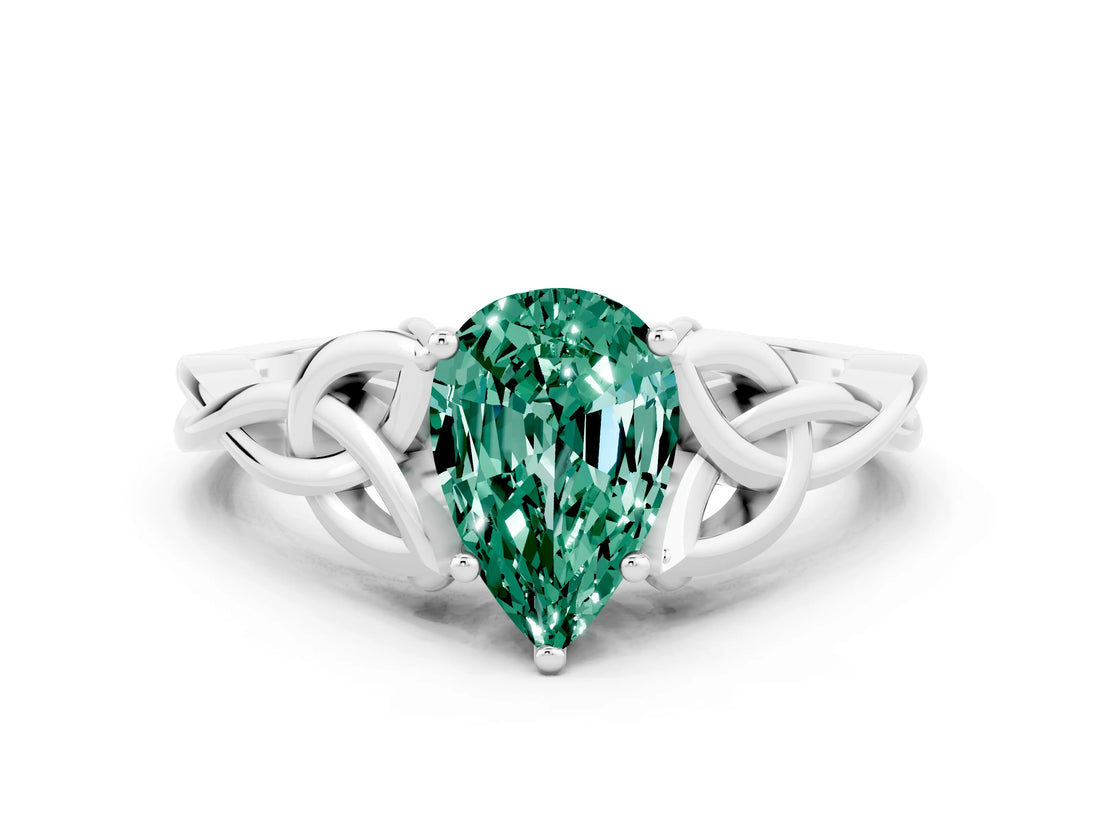 White gold Pear Cut Green Sapphire Solitaire Engagement Ring with Celtic Knot Band and Four-Prong Setting