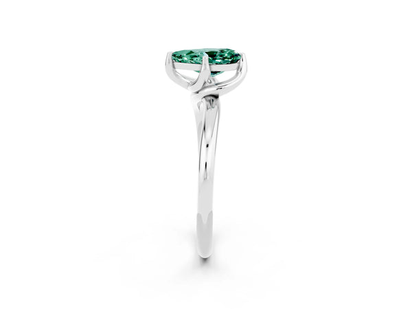 Platinum Pear Cut Green Sapphire Solitaire Engagement Ring with Four-Prong Setting and Classic Band