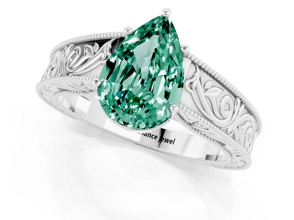 Platinum Pear Cut Green Sapphire Solitaire Ring with Engraved Band and Four-Prong Setting