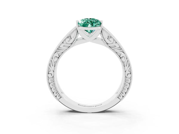 Silver Pear Cut Green Sapphire Solitaire Ring with Engraved Band and Four-Prong Setting