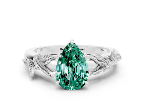 White gold Pear Cut Green Sapphire Solitaire Ring with Leaf Motif Band and Four-Prong Setting