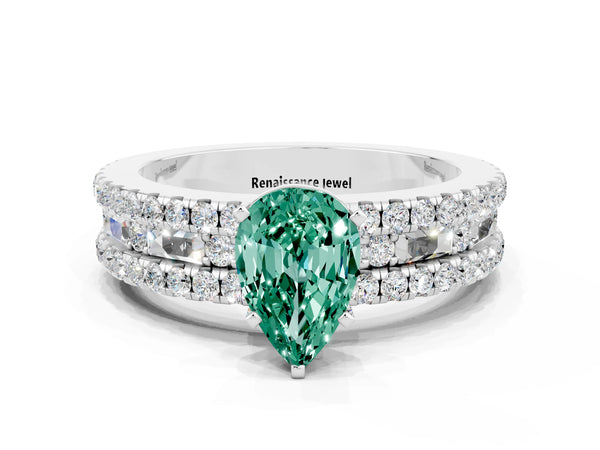 Platinum Pear Cut Green Sapphire Solitaire Ring with Pavé and Channel Set Band