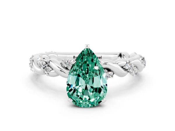 Platinum Pear Cut Green Sapphire Solitaire Ring with Twisted Band and Pavé Accents