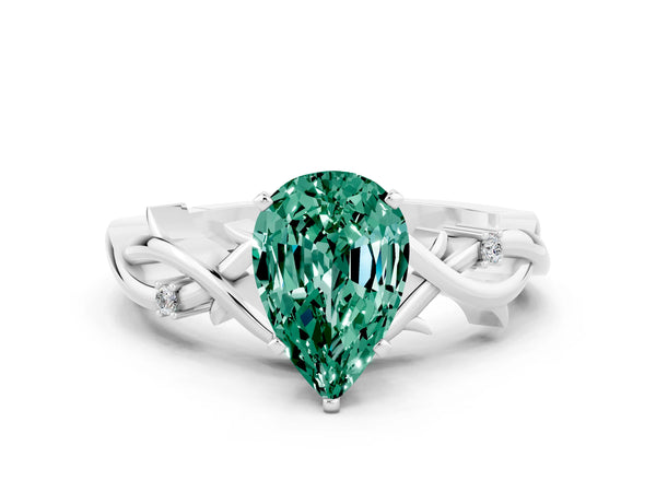 Platinum Pear Cut Green Sapphire Solitaire Ring with Twisted Band and Prong Setting