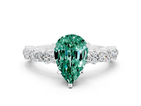 Platinum Pear Cut Green Sapphire Side Stone Solitaire Ring with Round  and Four-Prong Setting