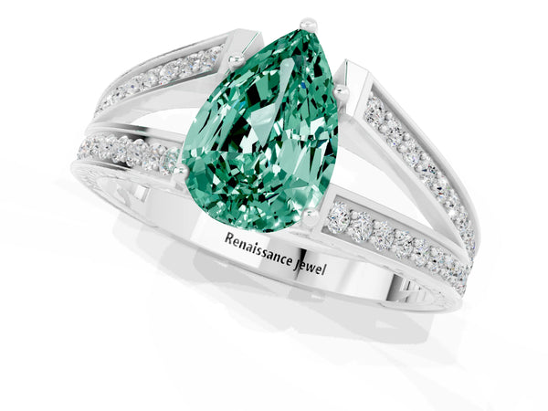 White gold Pear Cut Green Sapphire Split Shank Ring with Pavé Band and Four-Prong Setting