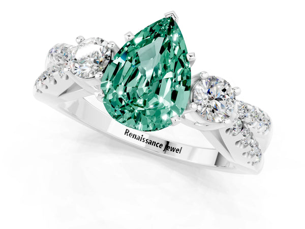 Platinum Pear Cut Green Sapphire Three-Stone Ring with Pavé Split Shank and Four-Prong Setting