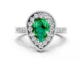 White gold Pear Cut Halo Diamond Engagement Ring with Milgrain Pave Band and Four-Prong Setting