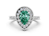 White gold Pear Cut Halo Diamond Engagement Ring with Milgrain Pave Band and Four-Prong Setting