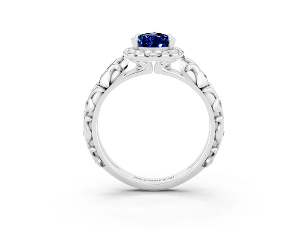 Platinum Pear Cut Blue Sapphire Halo Ring with Filigree Band and Prong Setting