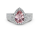 White gold Pear Cut Halo Pavé Diamond Engagement Ring with Split Shank and Four-Prong Setting