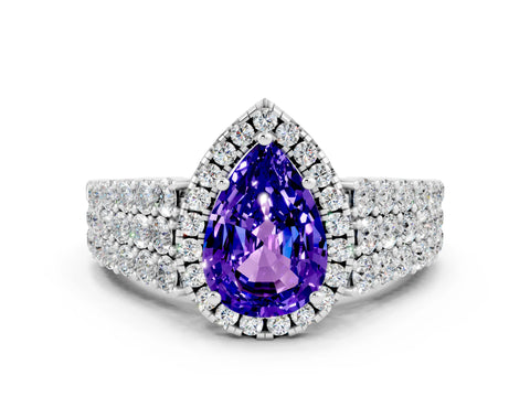 White gold Pear Cut Halo Pavé Diamond Engagement Ring with Split Shank and Four-Prong Setting