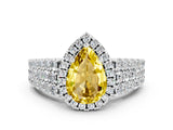 White gold Pear Cut Halo Pavé Diamond Engagement Ring with Split Shank and Four-Prong Setting