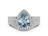 White gold Pear Cut Halo Pavé Diamond Engagement Ring with Split Shank and Four-Prong Setting