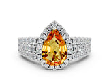 White gold Pear Cut Halo Pavé Diamond Engagement Ring with Split Shank and Four-Prong Setting