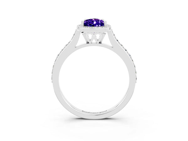 Silver Pear Cut Tanzanite Halo Engagement Ring with Round Pavé Shoulders and Prong Setting