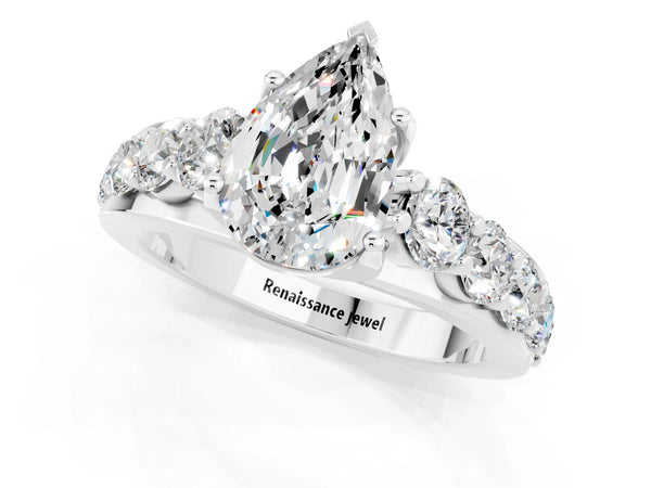 Silver Pear Cut Moissanite Engagement Ring with Pavé Band and Four-Prong Setting