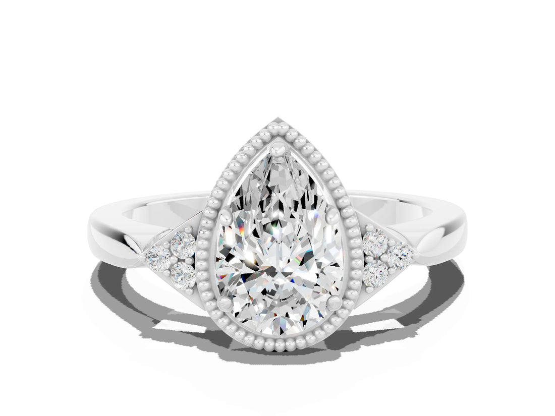 White gold Pear Cut Moissanite Halo Ring with Tapered Band and Four-Prong Setting