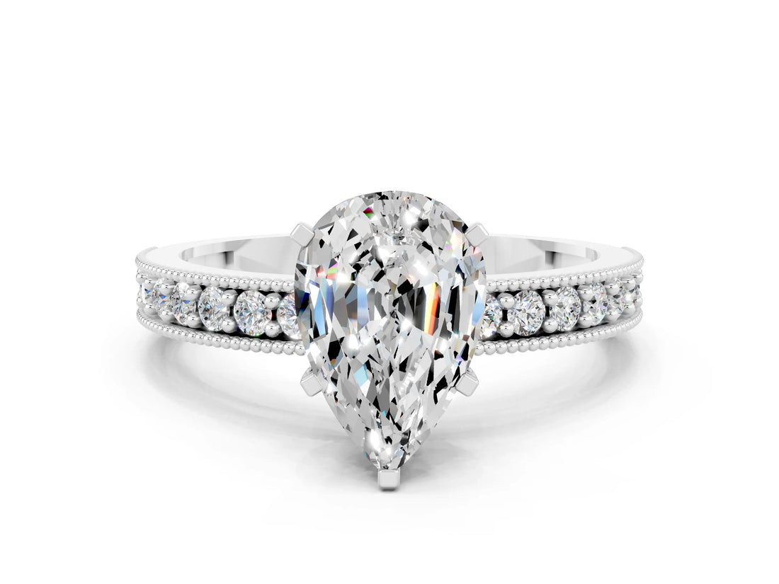 White gold Pear Cut Moissanite Milgrain Pavé Engagement Ring with Four-Prong Setting