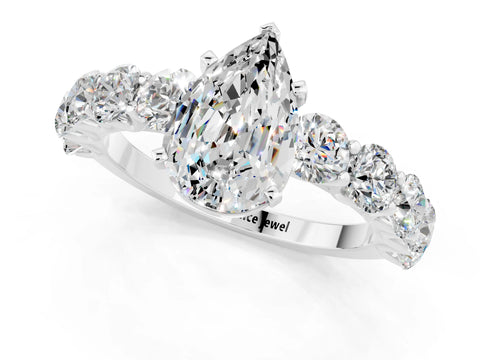White gold Pear Cut Moissanite Prong Setting with Side Stones on a Pave Band_1