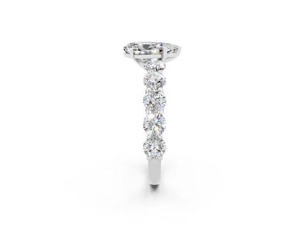 Silver Pear Cut Moissanite Prong Setting with Side Stones on a Pave Band