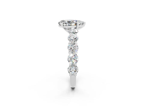 White gold Pear Cut Moissanite Prong Setting with Side Stones on a Pave Band_2