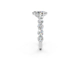 White gold Pear Cut Moissanite Prong Setting with Side Stones on a Pave Band_2