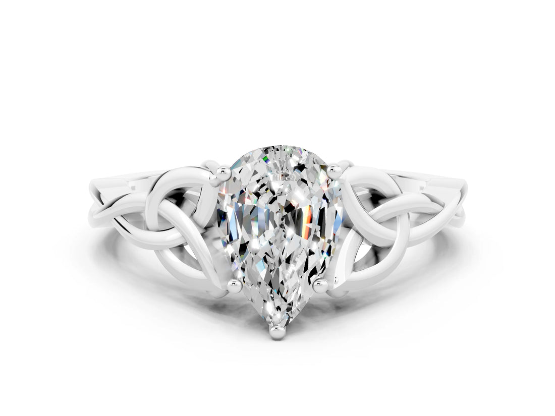 White gold Pear Cut Moissanite Solitaire Engagement Ring with Celtic Knot Band and Four-Prong Setting