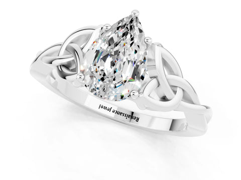 White gold Pear Cut Moissanite Solitaire Engagement Ring with Celtic Knot Band and Four-Prong Setting_1