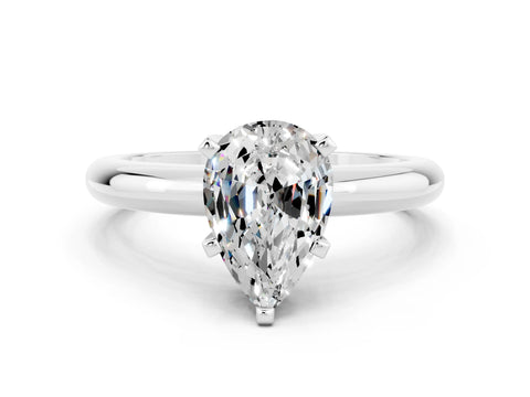 White gold Pear Cut Moissanite Solitaire Engagement Ring with Round Band and Four-Prong Setting