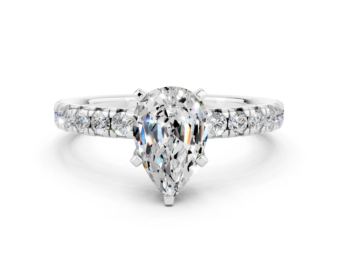 White gold Pear Cut Moissanite Solitaire Pavé Engagement Ring with Round Band and Prong Setting_90