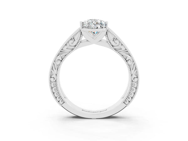Silver Pear Cut Moissanite Solitaire Ring with Engraved Band and Four-Prong Setting