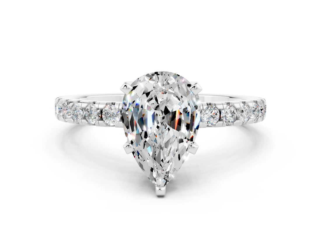 White gold Pear Cut Moissanite Solitaire Ring with Pavé Band and Four-Prong Setting_24