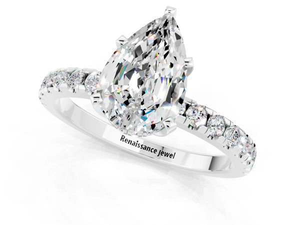 Silver Pear Cut Moissanite Solitaire Ring with Round  Pavé Band and Four-Prong Setting
