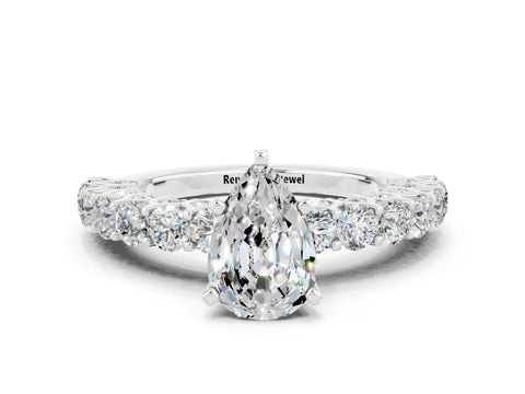 White gold Pear Cut Moissanite Solitaire Ring with Shared Prong Pavé Band and Four-Prong Setting