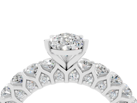 White gold Pear Cut Moissanite Solitaire Ring with Shared Prong Pavé Band and Four-Prong Setting_4