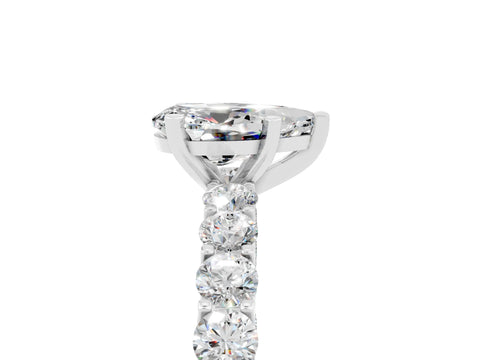White gold Pear Cut Moissanite Solitaire Ring with Shared Prong Pavé Band and Four-Prong Setting_5