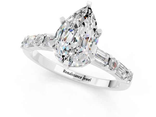 Platinum Pear Cut Moissanite Solitaire with Side Baguettes and Channel Set Band
